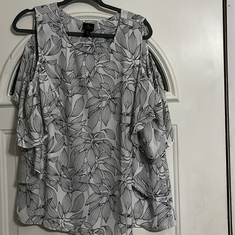 Black and white leaf print cold shoulder blouse.